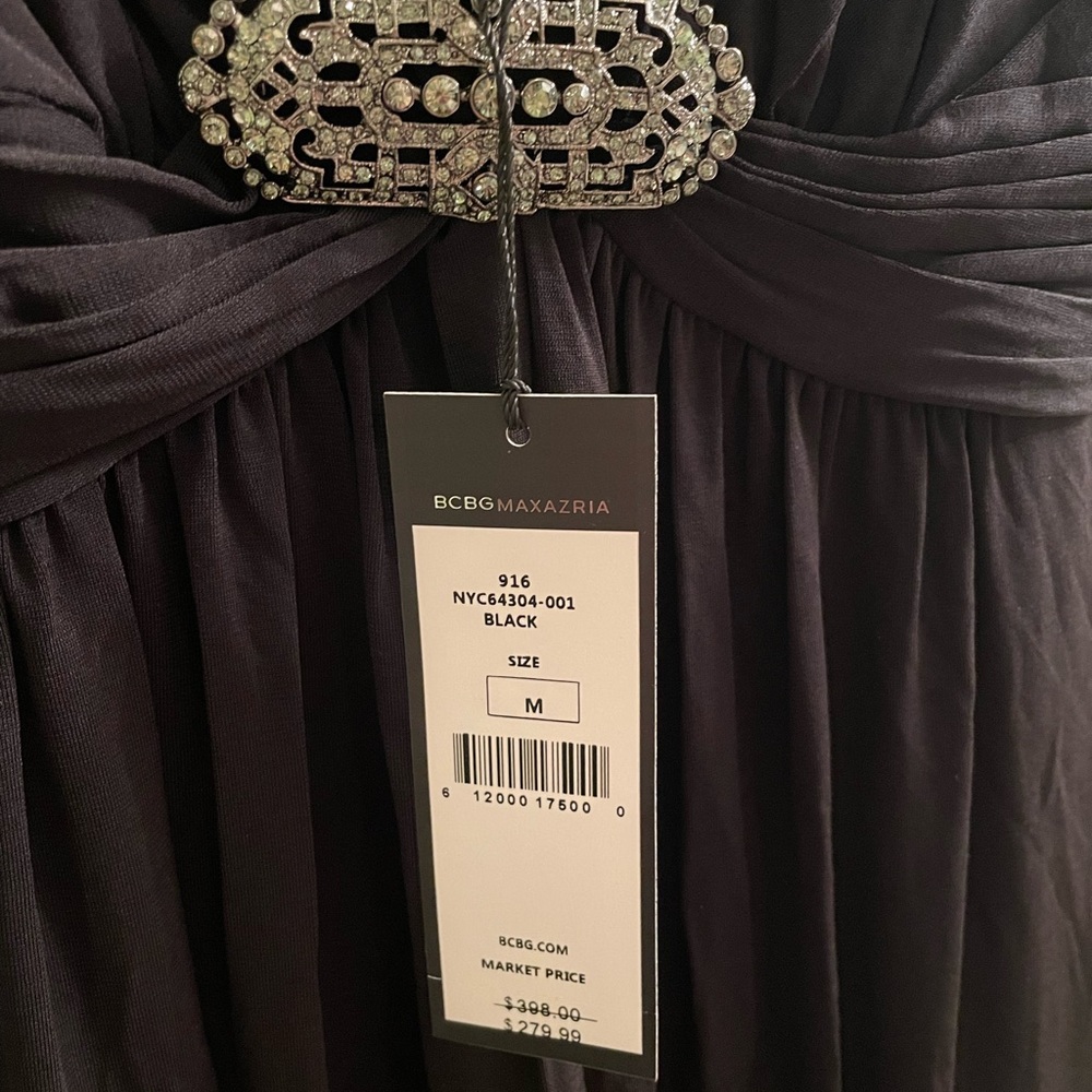 New with tag BCBG Maxazria Black floor length a-line gown with rhinestone brooch